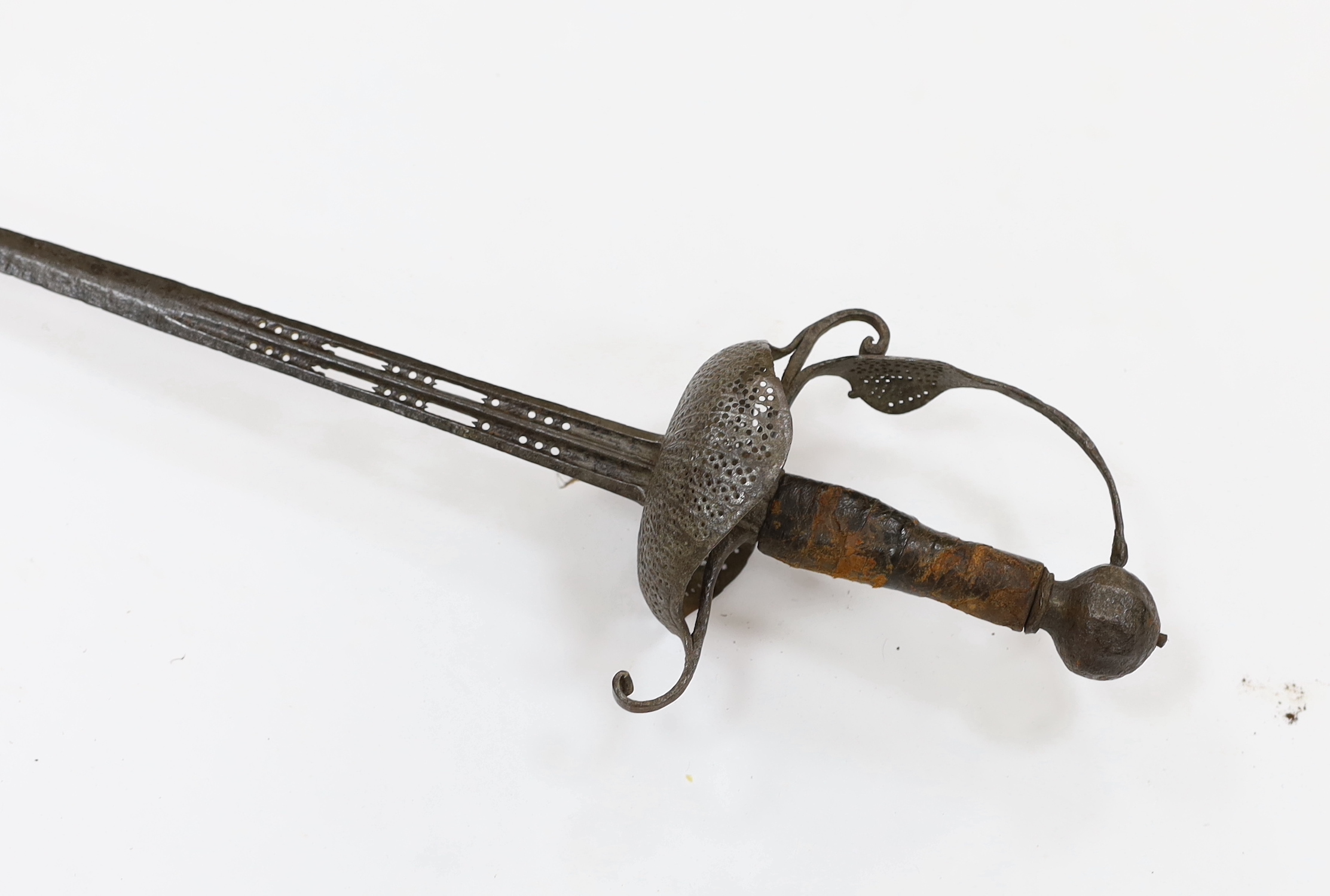 A mid 17th century English rapier, with pierced steel cup guard, loop guard and top of blade, steel pommell and leather grip, blade 77cm